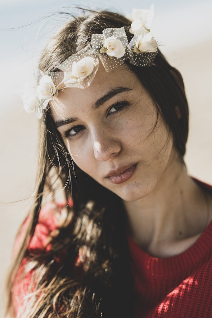Photo of Woman Wearing White Flower Crown