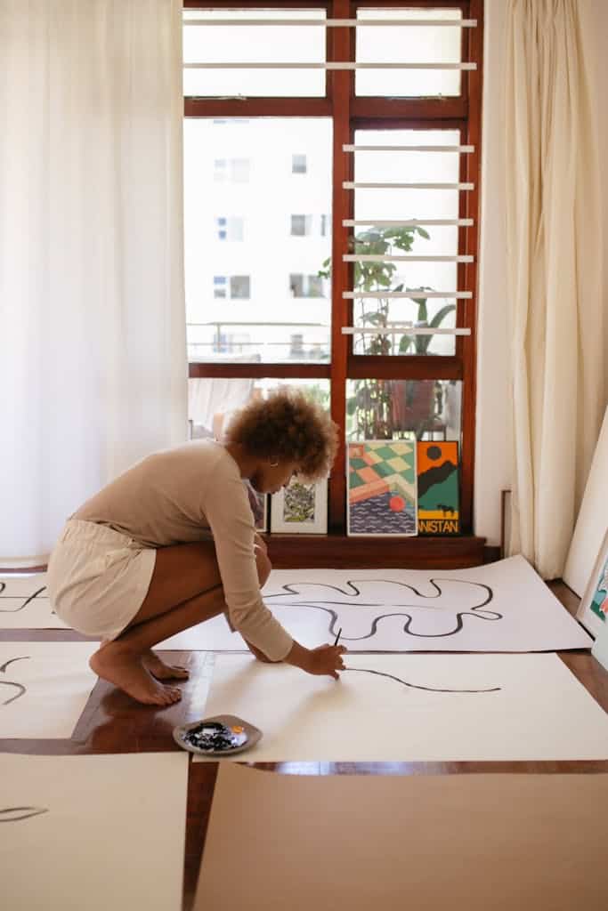 Photo Of Woman Drawing On White Canvas, the art of hypnosis